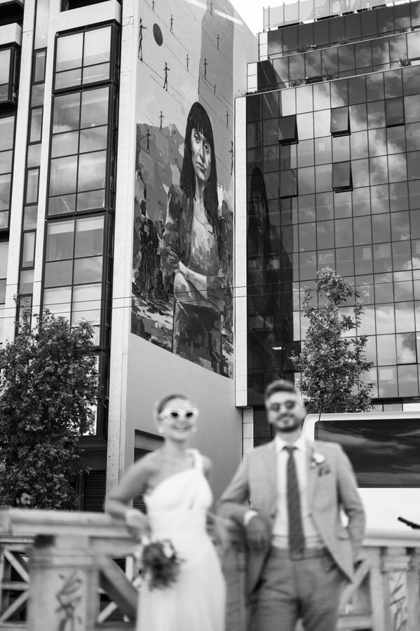 Stylish bride and groom in Athens architecture