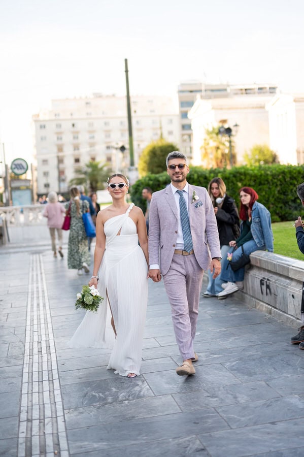 Stylish bride and groom in Athens architecture