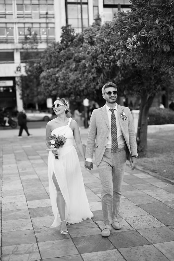 Stylish bride and groom in Athens architecture