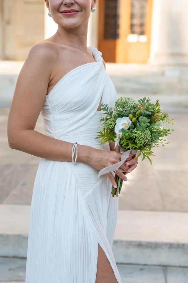 Stylish bride and groom in Athens architecture