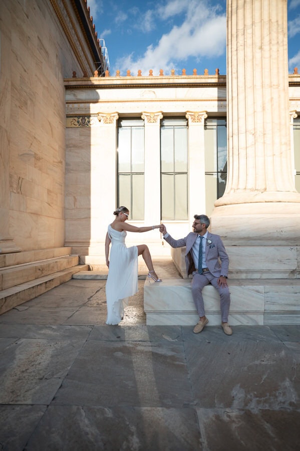 Stylish bride and groom in Athens architecture