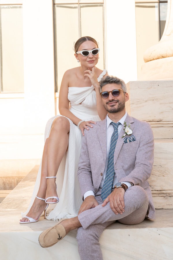Stylish bride and groom in Athens architecture