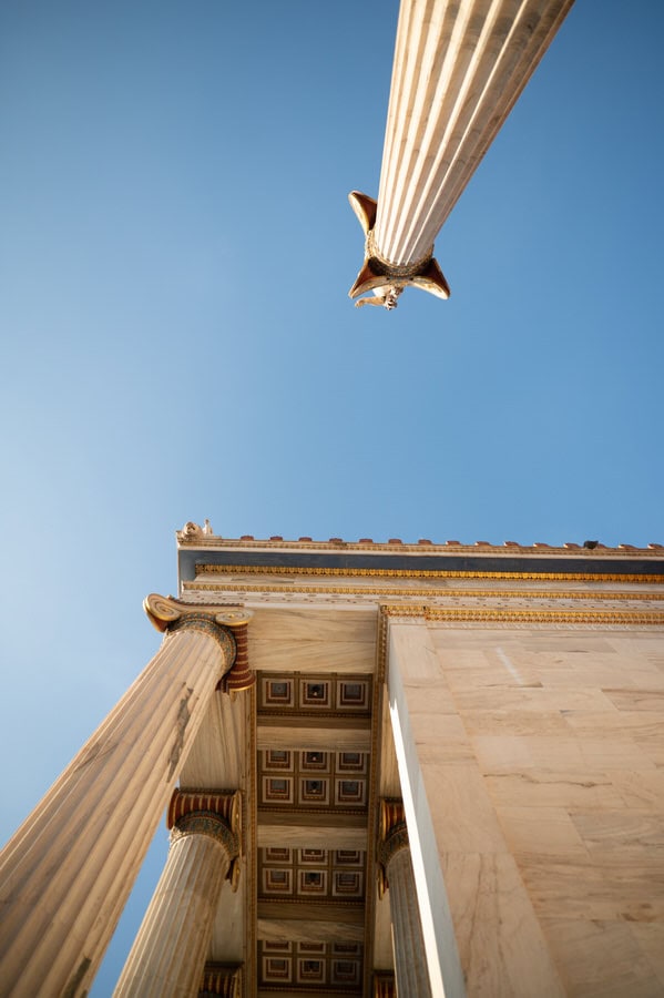 Stylish bride and groom in Athens architecture
