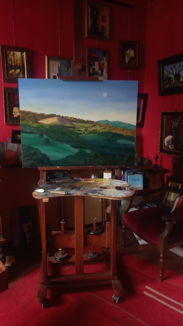 Under the Tuscan Moon original oil painting by Andrea Bocedi on an easel in the studio