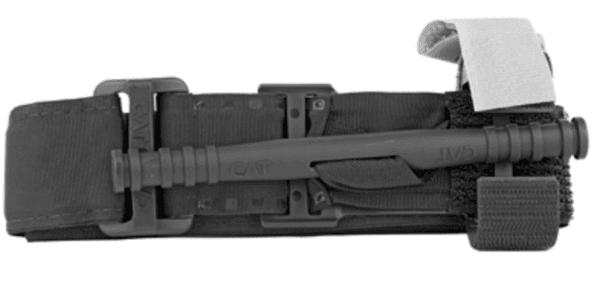 Compact Combat Application Tourniquet (CAT) mounted on a nylon strap with securing clips, viewed flat.