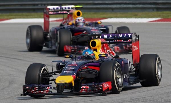 MOTORSPORT - F1 2014 - GRAND PRIX OF MALAYSIA  - SEPANG (MAL) - 28 TO 30/03/2014 - PHOTO : CLEMENT MARIN / DPPI -  VETTEL SEBASTIAN (GER) - RED BULL RENAULT RB10 - ACTION RICCIARDO DANIEL (AUS) - RED BULL RENAULT RB10 - ACTION