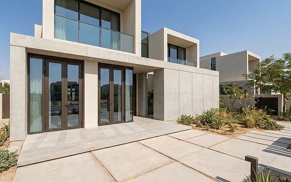 Bronze aluminium French glass doors on a modern Dubai villa facade