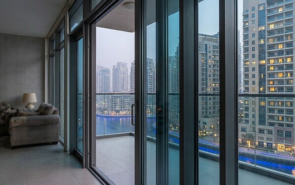 Sliding balcony door on a Marina apartment gliding on its track