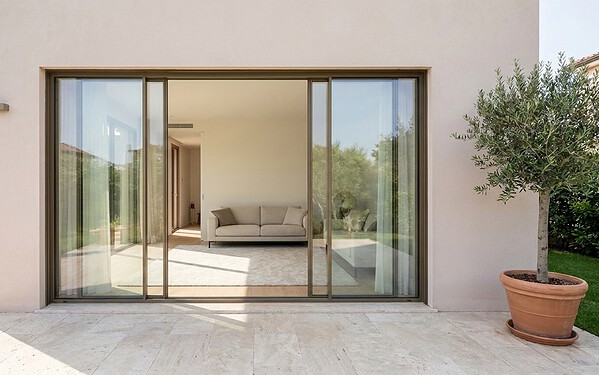 Aluminium sliding glass doors on a Dubai villa exterior