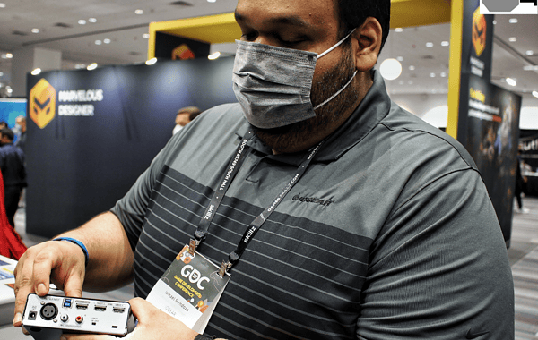Ismael Mendoza at the IOGear booth during the Game Developers Conference 2022. 8Bit/Digi