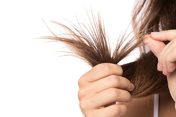 Not cutting split ends is a hair mistakes that can affect hair growth