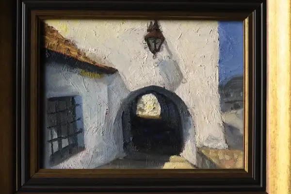 Framed Kazimierskie Podcienie architecture painting displayed in Andrea Bocedi’s studio