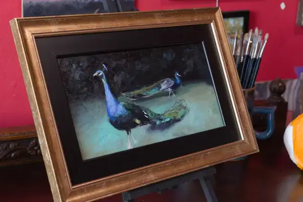 Pavoni original peacock oil painting from Monza displayed in a studio interior