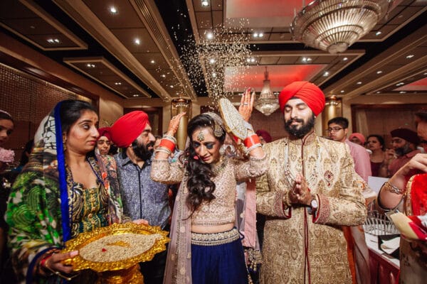 Bride and groom welcomed home by family after the Doli