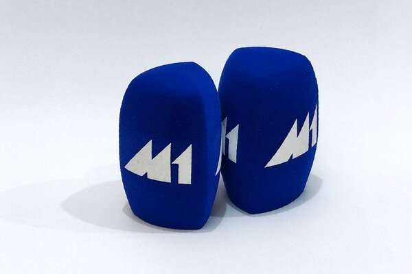 M-1 Lithuanian radio branded studio microphone windshields with blue cylindrical foam and white arrow logo