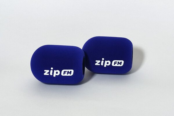 ZIP FM Lithuanian radio branded studio microphone windshields with blue cylindrical foam covers and white logo