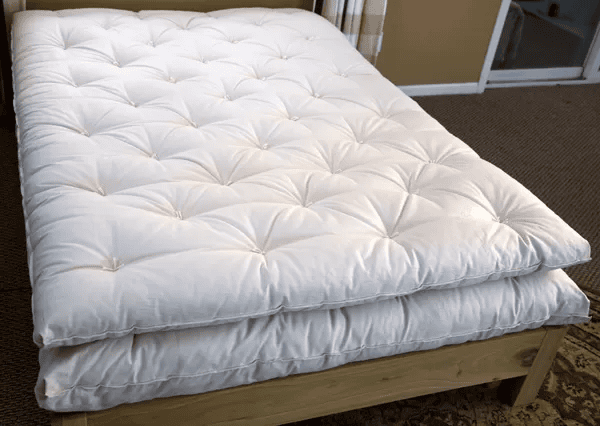 wool mattress topper (topper is on top)