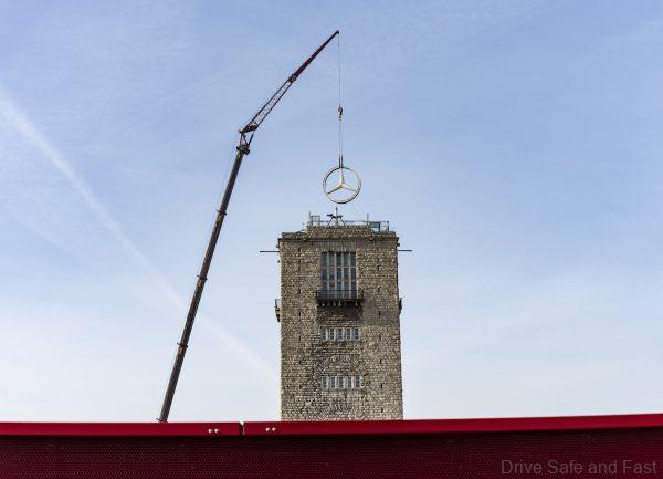 Mercedes star on the train main station tower in Stuttgart is dismantled due to the construction, March 2021