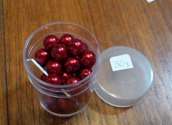 beads in coin tube