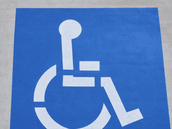 ADA-compliant handicap parking stall with ISA symbol , North Houston TX