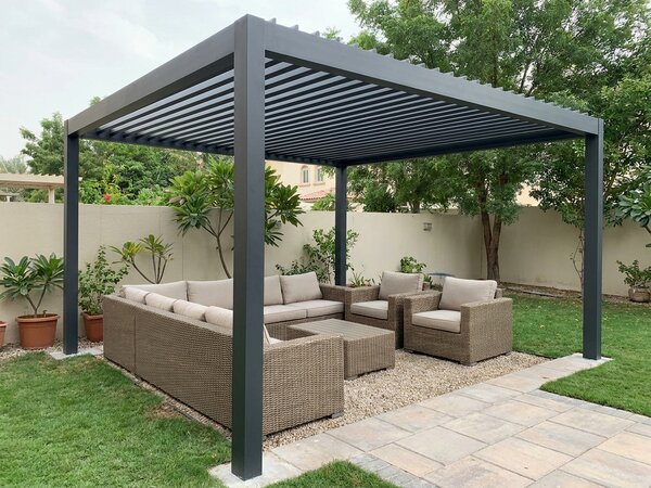 Aluminium pergola over a Mirdif garden seating area