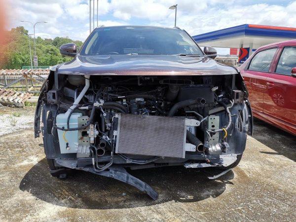 Proton X70 with front bumper damage