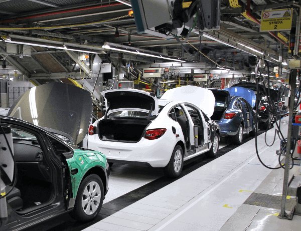 Handheld XRF analyzer used in automotive manufacturing for metal composition testing