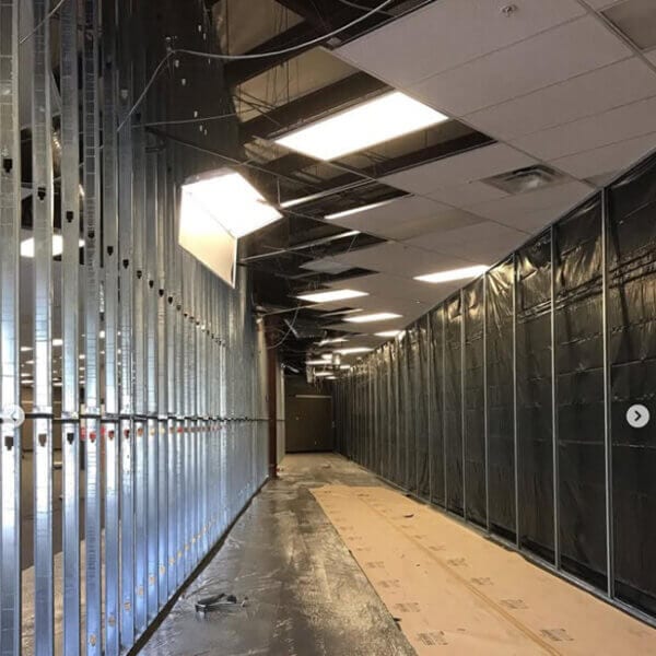 Commercial Electrical Services relocating electrical panels, lighting circuits, and moving fixtures to split a store in St Augustine.