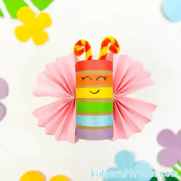 rainbow butterfly craft made from a toilet paper roll