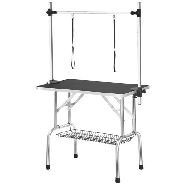Adjustable arm pet grooming table for different dog sizes