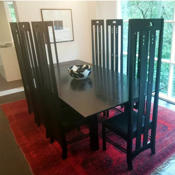Macintosh dining set, made as a reproduction of the classic Charles Rennie Mackintosh design, stain black with Black Japan on Tassie Oak solid timber. Finished in clear vanish for a hard-wearing surface. Custom made timber furniture. Custom made table and chairs.