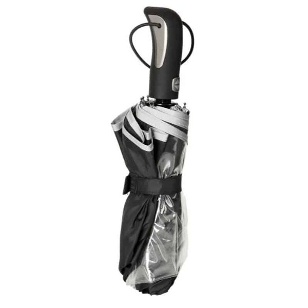 Kokoontaitettu sateenvarjo ikkunalla ja heijastinnauhalla.