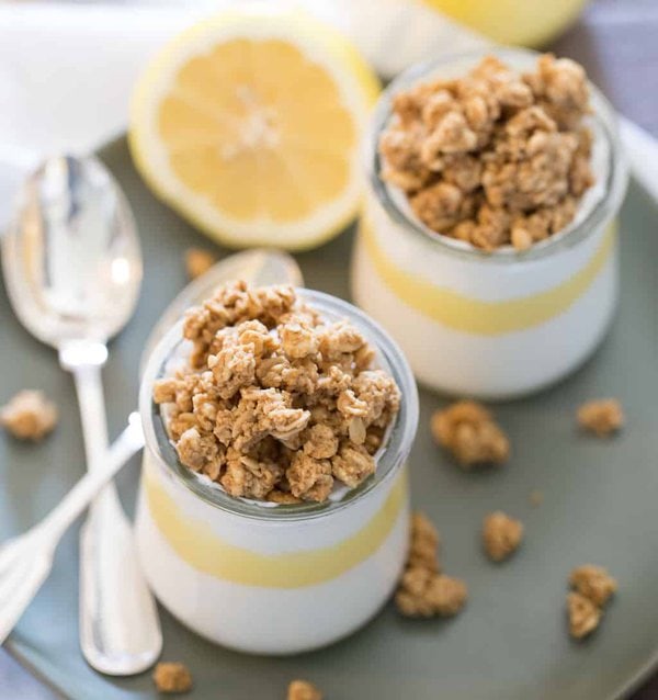 granola yogurt parfait with lemon curd and spoons