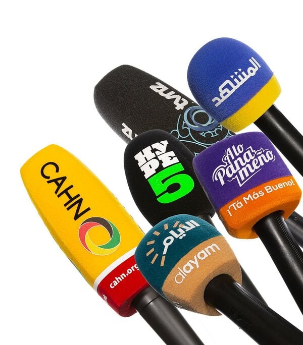 Variety of custom branded microphone windscreens with media logos