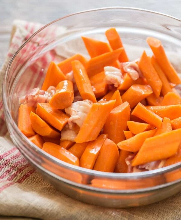 maple roasted carrots ready to coat in maple