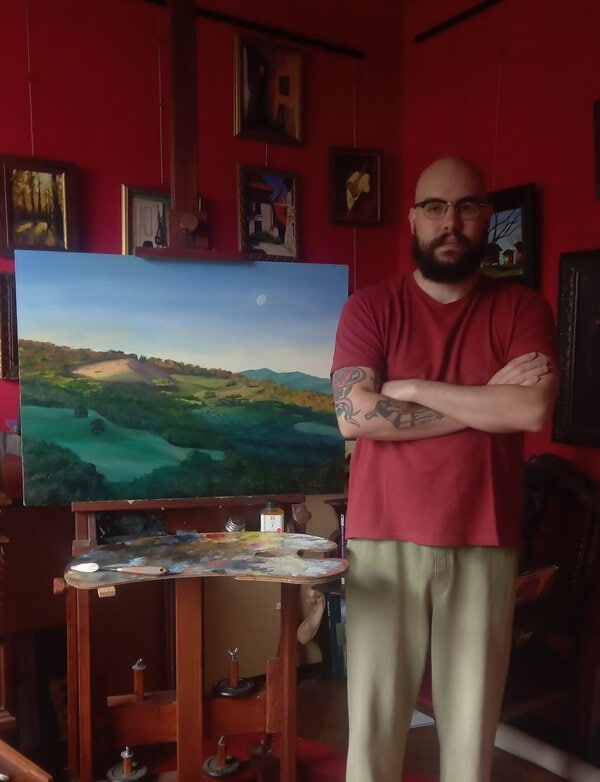 Under the Tuscan Moon original Tuscan landscape oil painting displayed in the studio with figure for scale