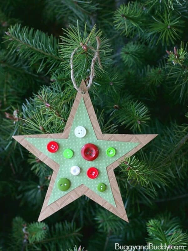 Homemade button star ornament hanging from Christmas tree