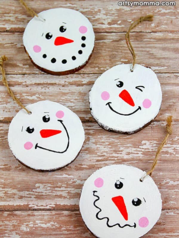 Snowman ornaments made with wood slices