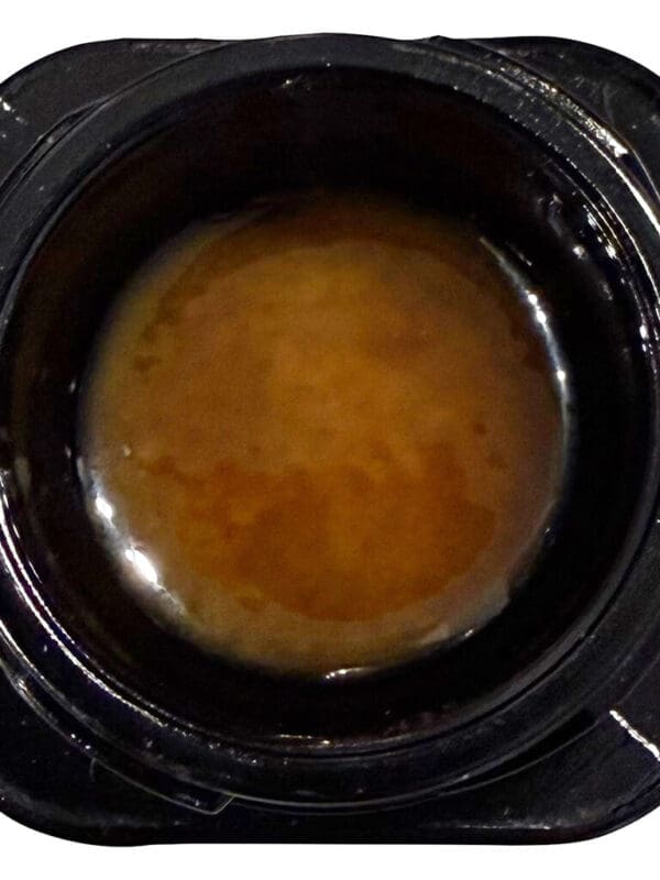 Just Kush Live Rosin Reserve 1g jar showing high-quality, cold-cured solventless concentrate.