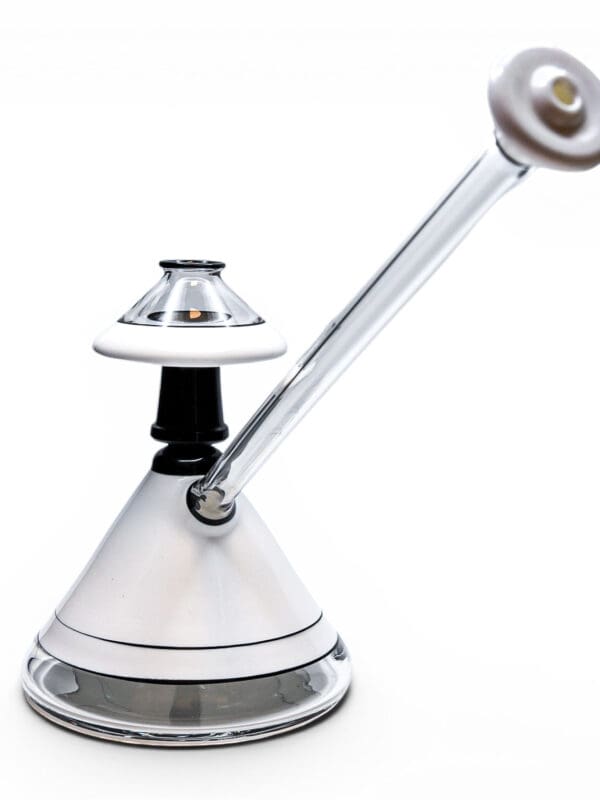 JAG Art Deco Pro Cane borosilicate glass dab rig featuring an opaque white cone base, black accents, and long clear mouthpiece.