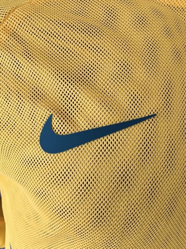 brazilian yellow playing uniform with a hat