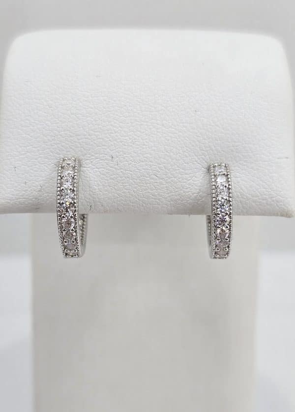 Sterling Silver .62ctw Moissanite Millgrain Huggies