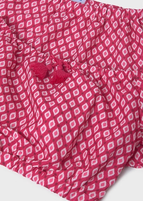 conjunto falda y top estampada. 6989