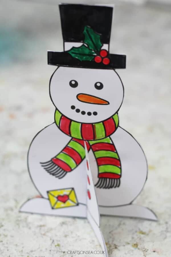 snowman card standing up against a white background