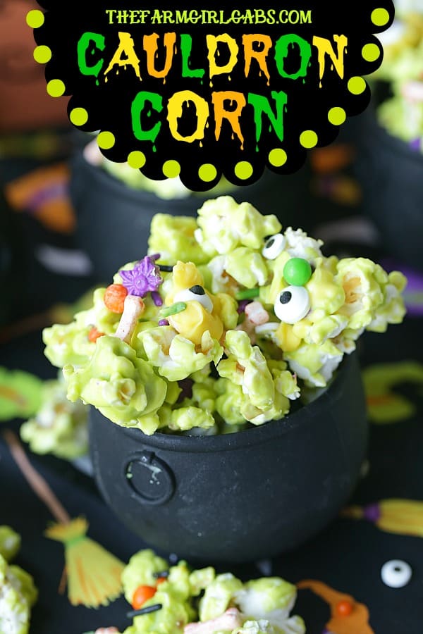 Double, double toil and trouble, Fire burn, and cauldron bubble. Stir up a batch of this ghoulish Cauldron Corn for some Halloween fun. #Halloween #Halloweenparty #HalloweenCandy #Snacks #Popcorn