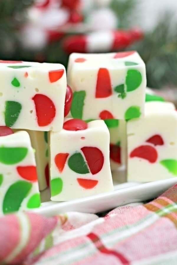 Make a batch of this delicious Christmas Gumdrop Nougat to share with friends and family during the holidays. This easy candy recipe is a real treat. #Nougat #Christmas #Candy #ChristmasNougat #GumDrops #CandyRecipe #HolidayBaking #ChristmasRecipe