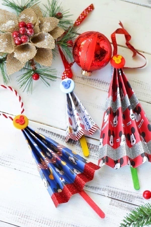 Add a magical touch to your Christmas tree with this easy Disney Accordion Tree Ornaments craft. Kids will love to create these Disney ornaments. #Disney #DisneyCraft #DisneyChristmas #ChristmasOrnaments #ChristmasDecorations #XmasDecor #MickeyMouse