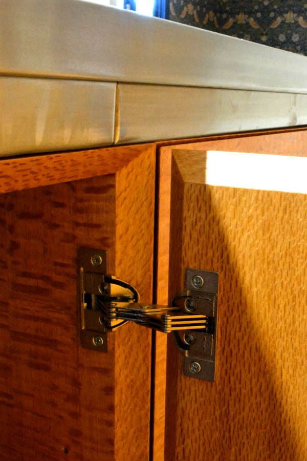Silky oak doors part of a custom made kitchen. Custom made joinery and cabinet making. With Miter detail doors