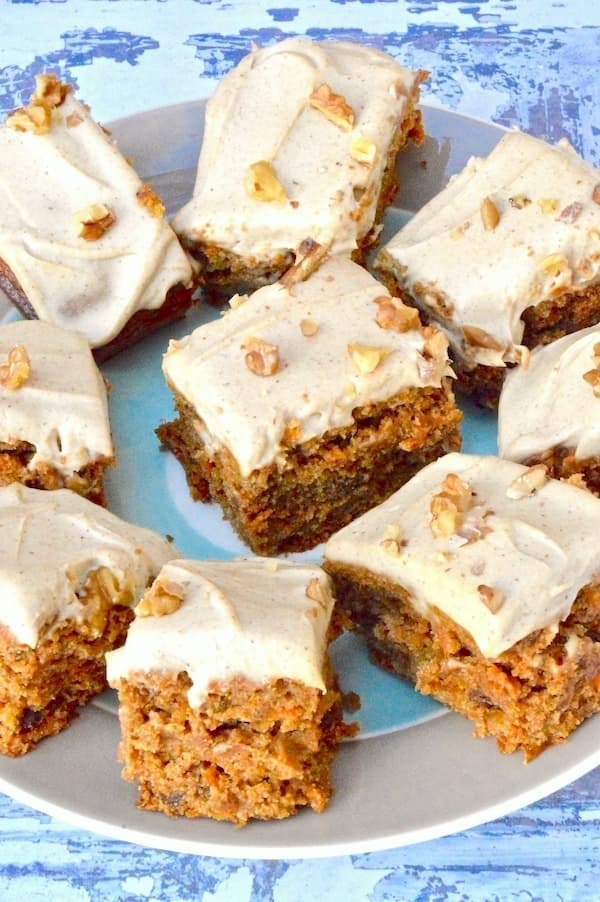 Vegan carrot cake with cashew icing from Tin and Thyme decorated with chopped nuts