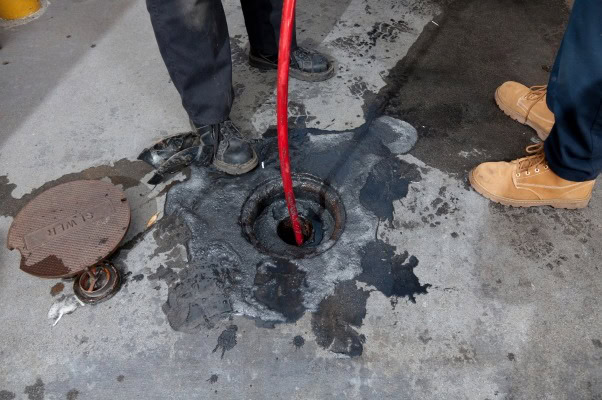 Liberty Drain team preparing equipment for underground pipe survey